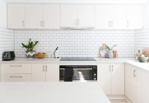 The Sleek, Space-Saving Dish Towel Organizer That Has Us Hooked