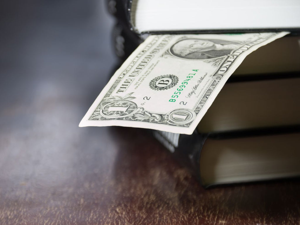 Lifting enrollment caps on two online public charter schools would come at a price — an estimated $7.7 million