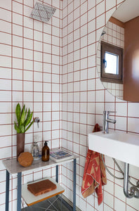 This Ingenious Organizer Instantly Doubled My Under-Counter Bathroom Space (It’s on Sale!)